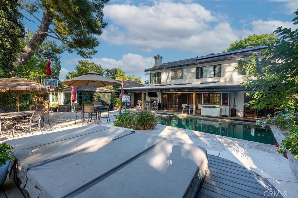 25261 Avenida Rondel Valencia, CA 91355 - Photo 53 of 68 a view of house with outdoor space and sitting area