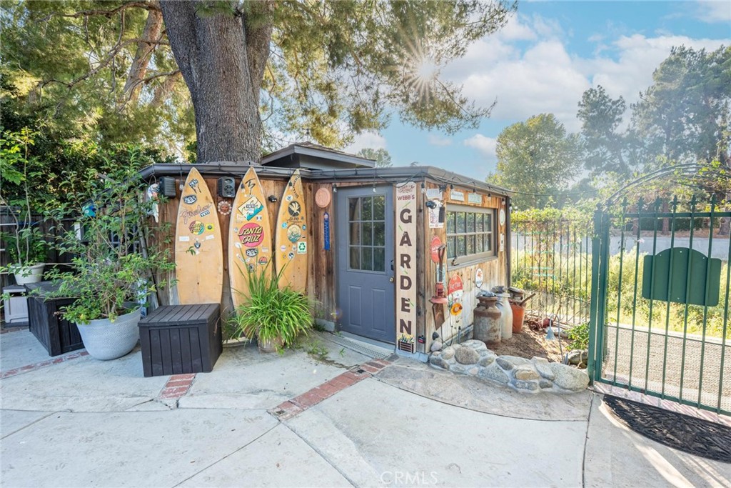 25261 Avenida Rondel Valencia, CA 91355 - Photo 62 of 68 a front view of a house with garden