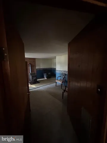 a view of living room and utility room