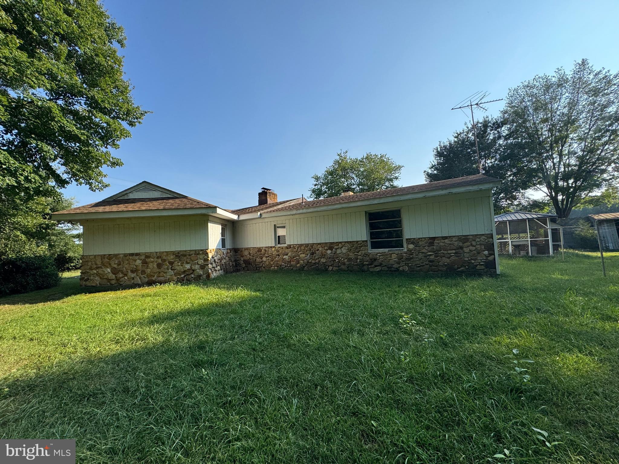 17990 Henderson Road Marydel, MD 21649 - Photo 2 of 24 a front view of a house with garden