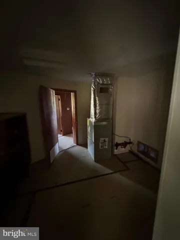 a living room with hard wood floor