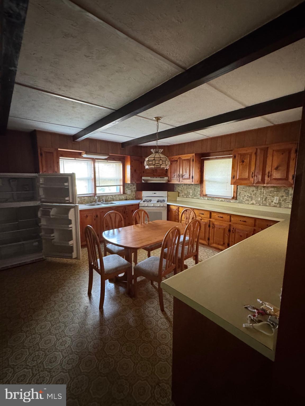 17990 Henderson Road Marydel, MD 21649 - Photo 8 of 24 a dining room with furniture and a floor to ceiling window