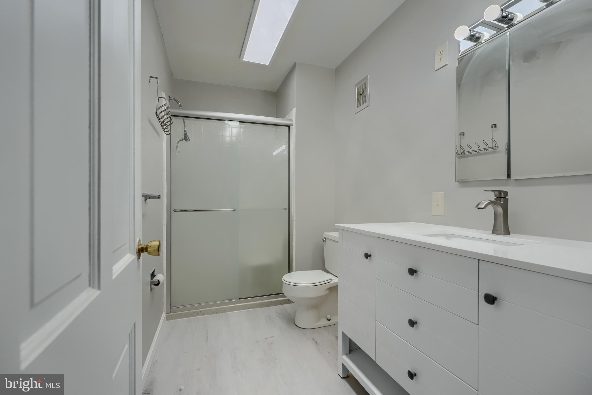 1012 Valewood Road Towson, MD 21286 - Photo 37 of 48 a bathroom with a sink a toilet and shower
