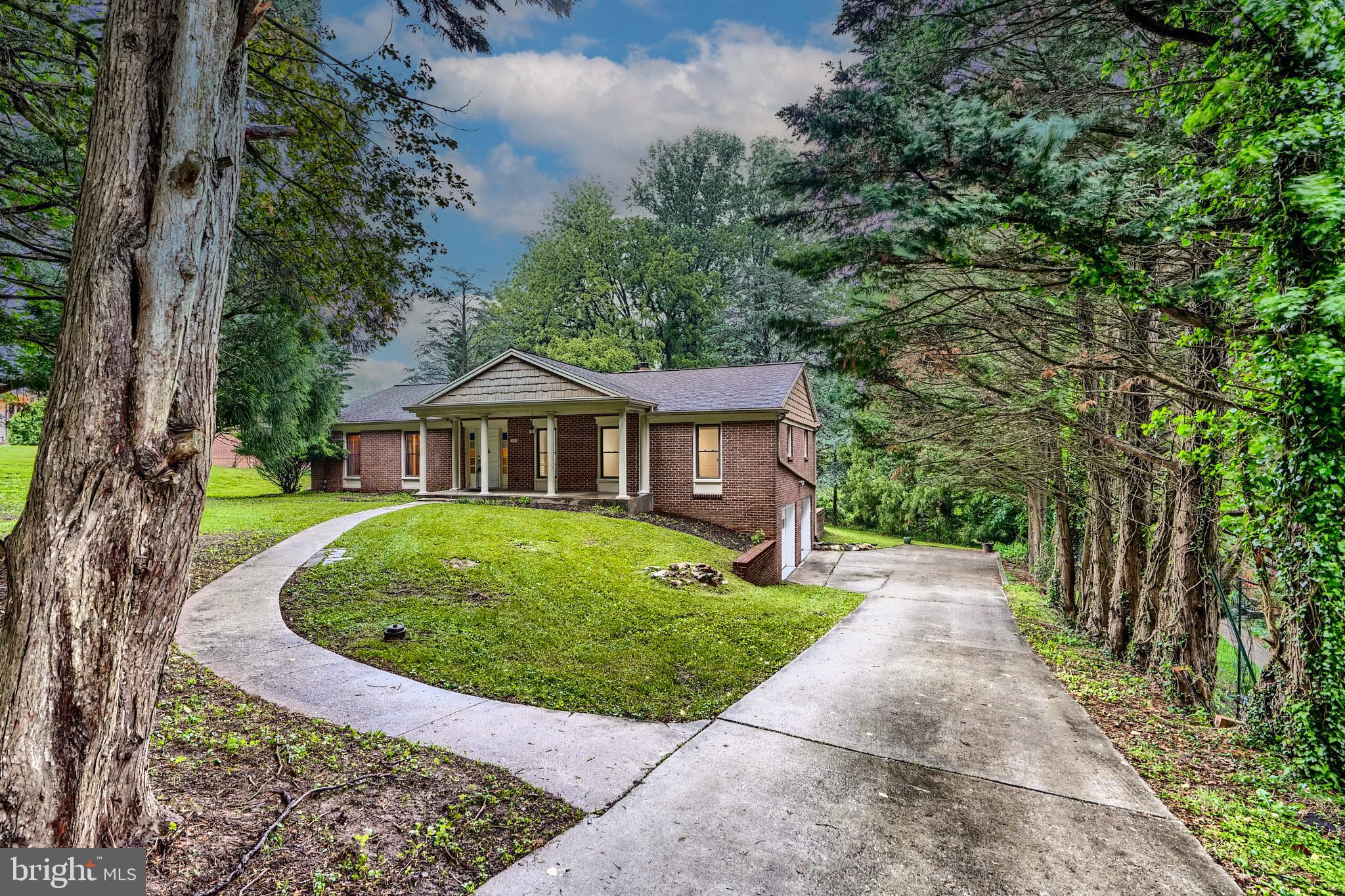 1012 Valewood Road Towson, MD 21286 - Photo 48 of 48 a front view of a house with garden