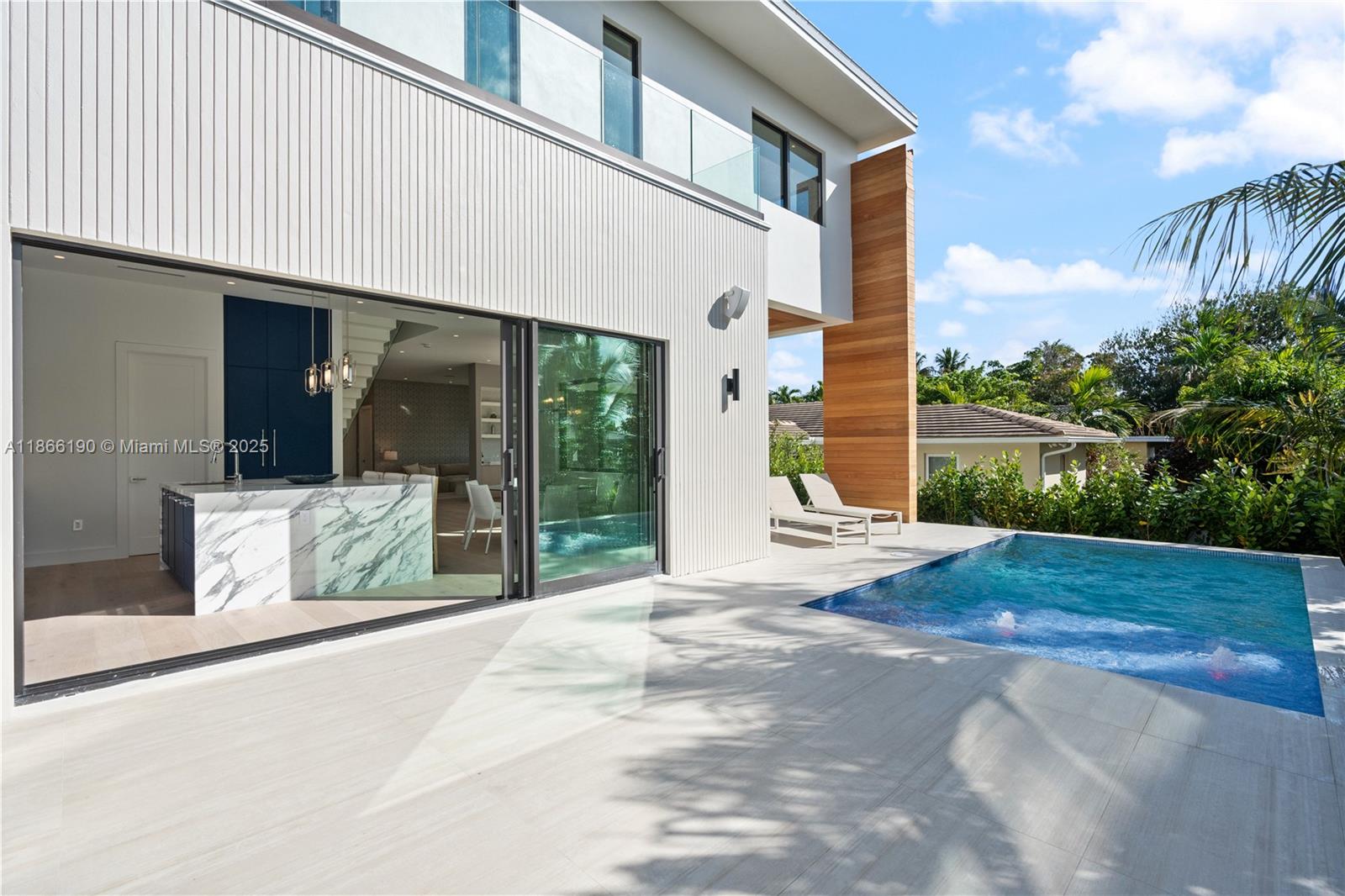 9132 Dickens Avenue Surfside, FL 33154 - Photo 32 of 37 a view of a house with backyard