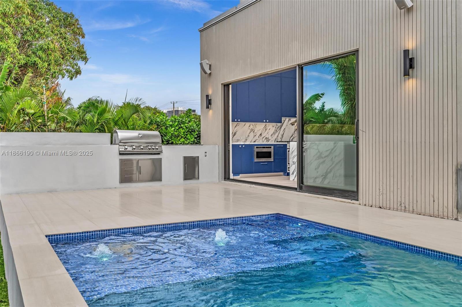 9132 Dickens Avenue Surfside, FL 33154 - Photo 34 of 37 wooden floor with a fireplace