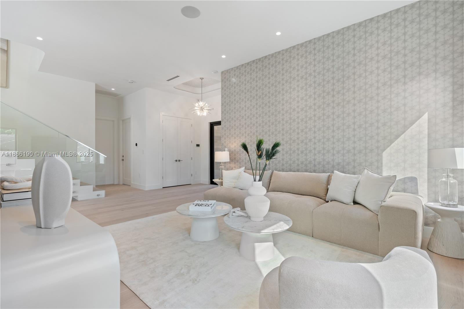 9132 Dickens Avenue Surfside, FL 33154 - Photo 7 of 37 a living room with furniture and a potted plant