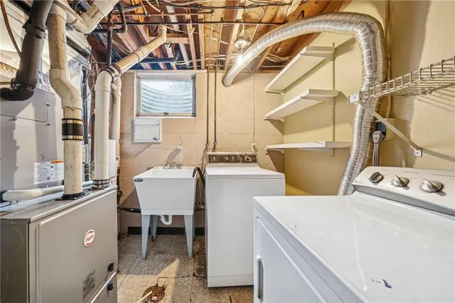 a bathroom with a toilet and a sink