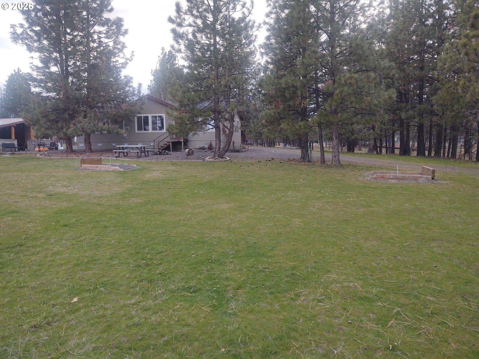 271 South Fairway Road, Unit B Tygh Valley, OR 97063 - Photo 16 of 31 a view of swimming pool and trees in the background