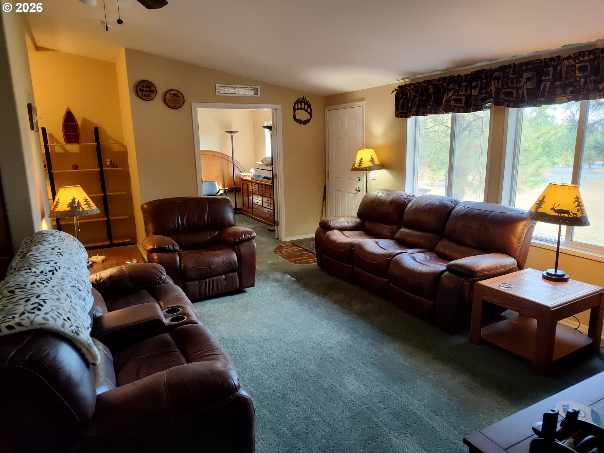 271 South Fairway Road, Unit B Tygh Valley, OR 97063 - Photo 2 of 31 a living room with furniture and a large window