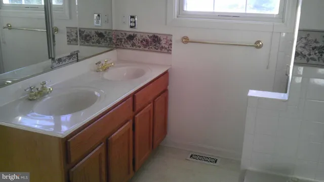 a view of a hallway with staircase