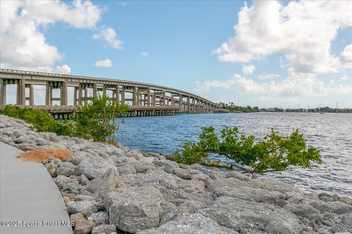 213 Sweet Street Rockledge, FL 32955 - Photo 36 of 38 a view of a pathway with a lake