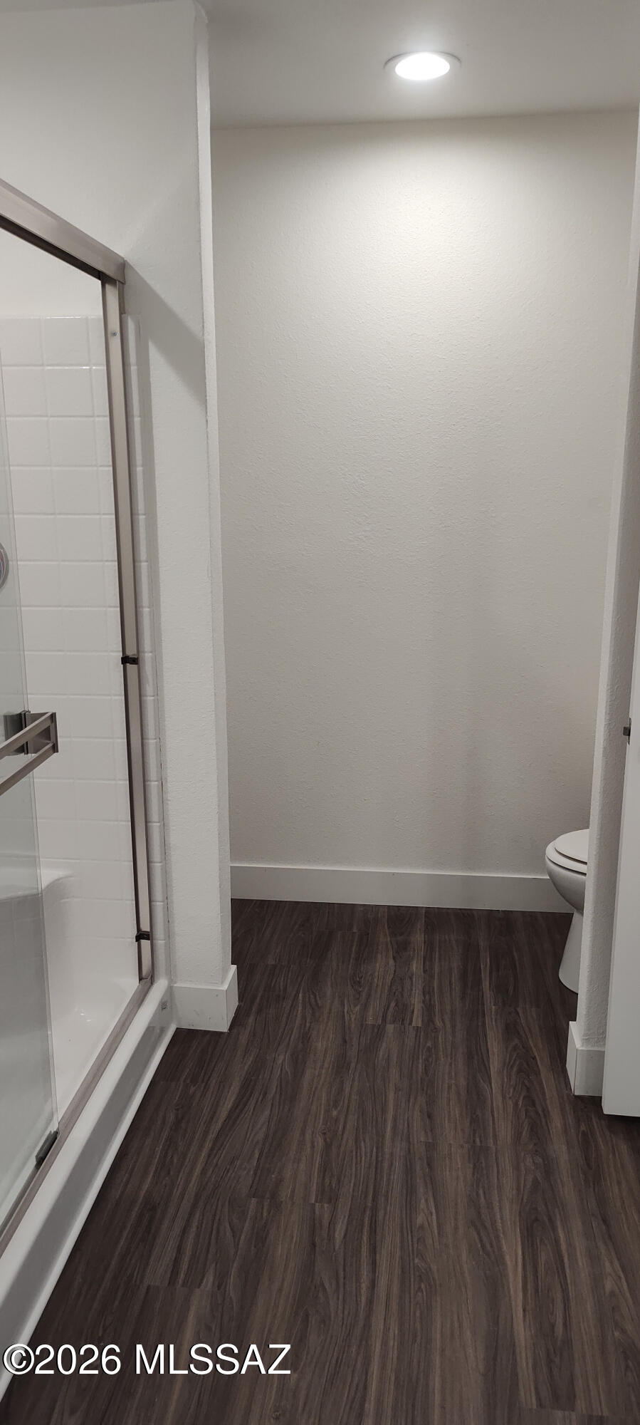 18565 West McClean Road Marana, AZ 85653 - Photo 20 of 37 an empty room with wooden floor and entrance