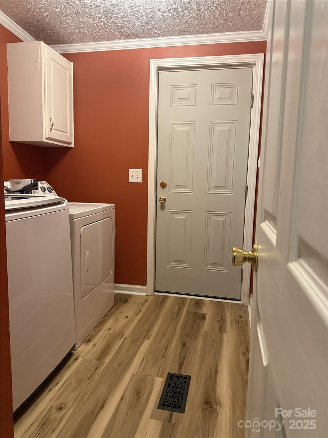 6636 Old Plank Road Stanley, NC 28164 - Photo 12 of 22 a view of a utility room with closet and windows