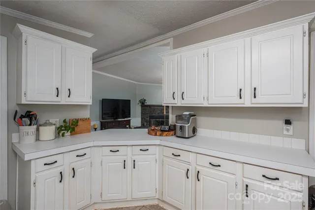 a storage & utility room with a window