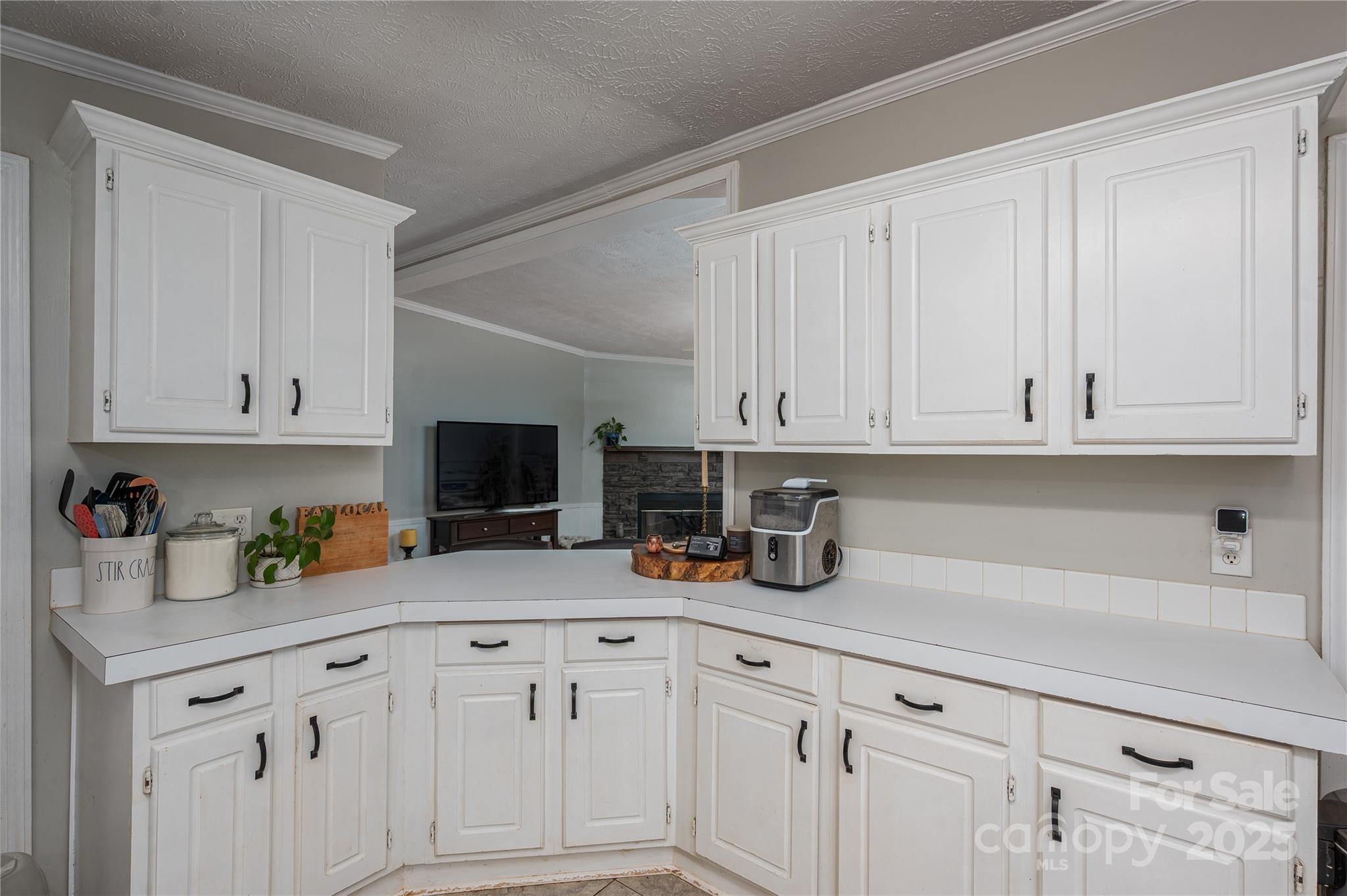 6636 Old Plank Road Stanley, NC 28164 - Photo 10 of 22 a kitchen with cabinets and a window