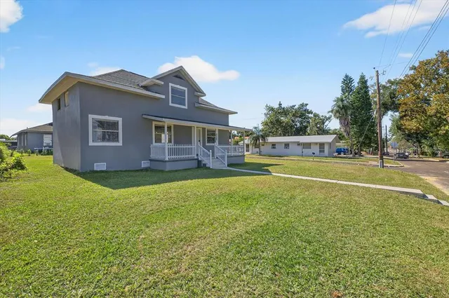a view of a house with a swimming pool
