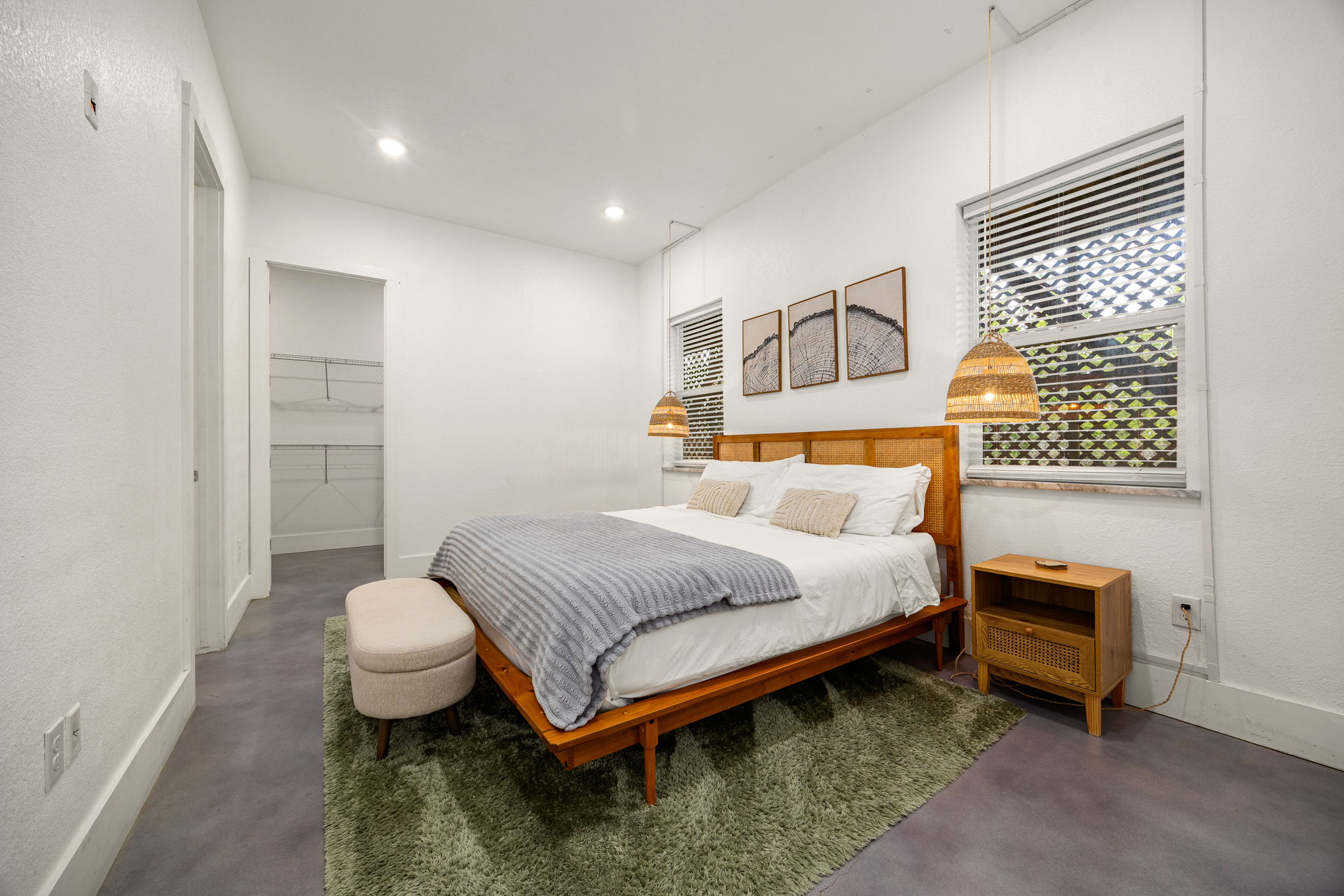 12808 Hughes Street Austin, TX 78732 - Photo 13 of 40 a bedroom with a bed and a window