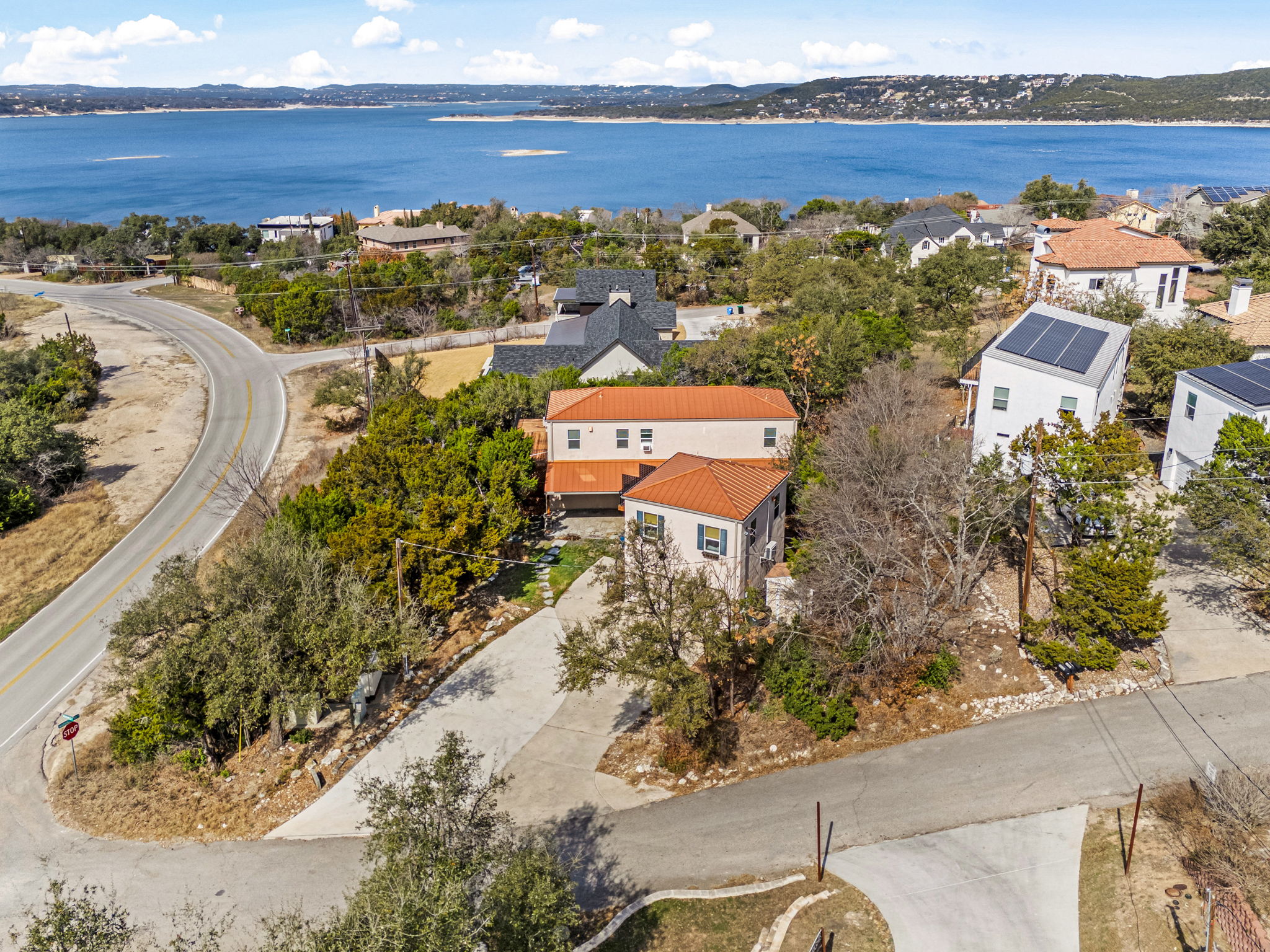 12808 Hughes Street Austin, TX 78732 - Photo 2 of 40 an aerial view of a house with a ocean view
