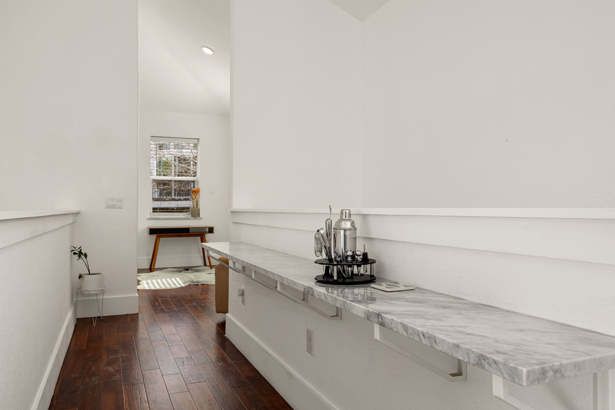 12808 Hughes Street Austin, TX 78732 - Photo 23 of 40 a view of a hallway with seating area