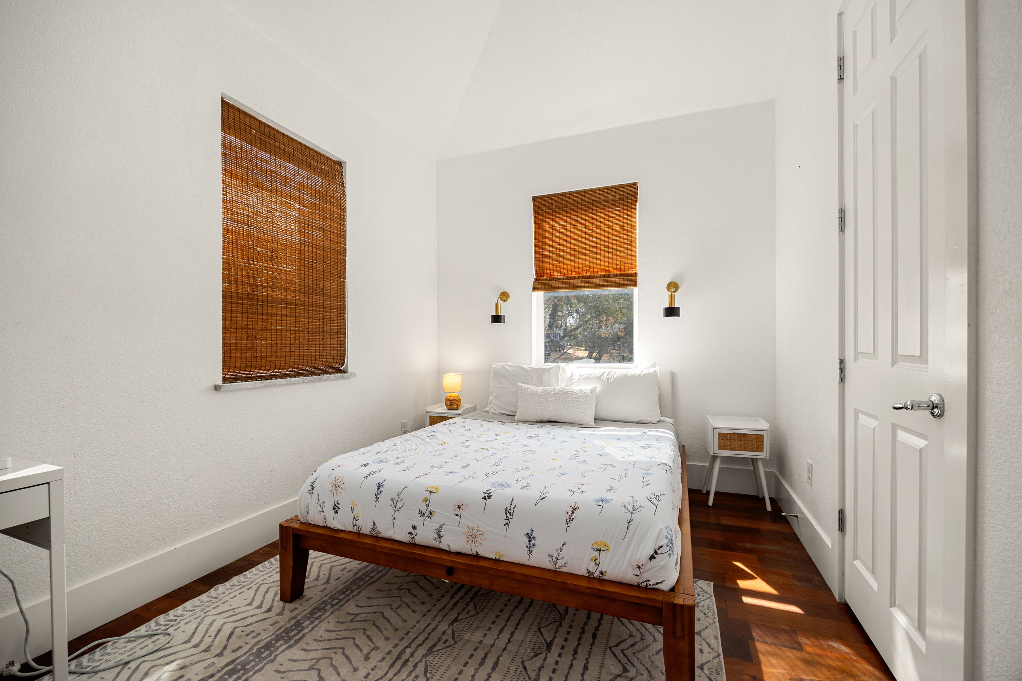 12808 Hughes Street Austin, TX 78732 - Photo 33 of 40 a bedroom with a bed and a window