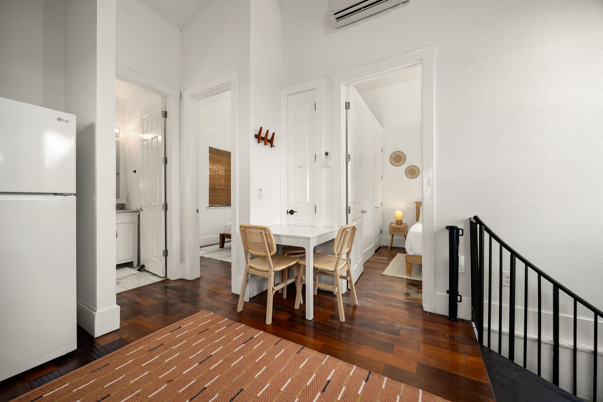12808 Hughes Street Austin, TX 78732 - Photo 36 of 40 a view of a a dining room with furniture window and wooden floor