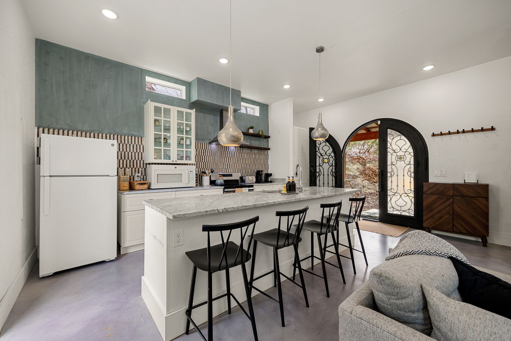 12808 Hughes Street Austin, TX 78732 - Photo 5 of 40 a view of kitchen with livingroom and furniture