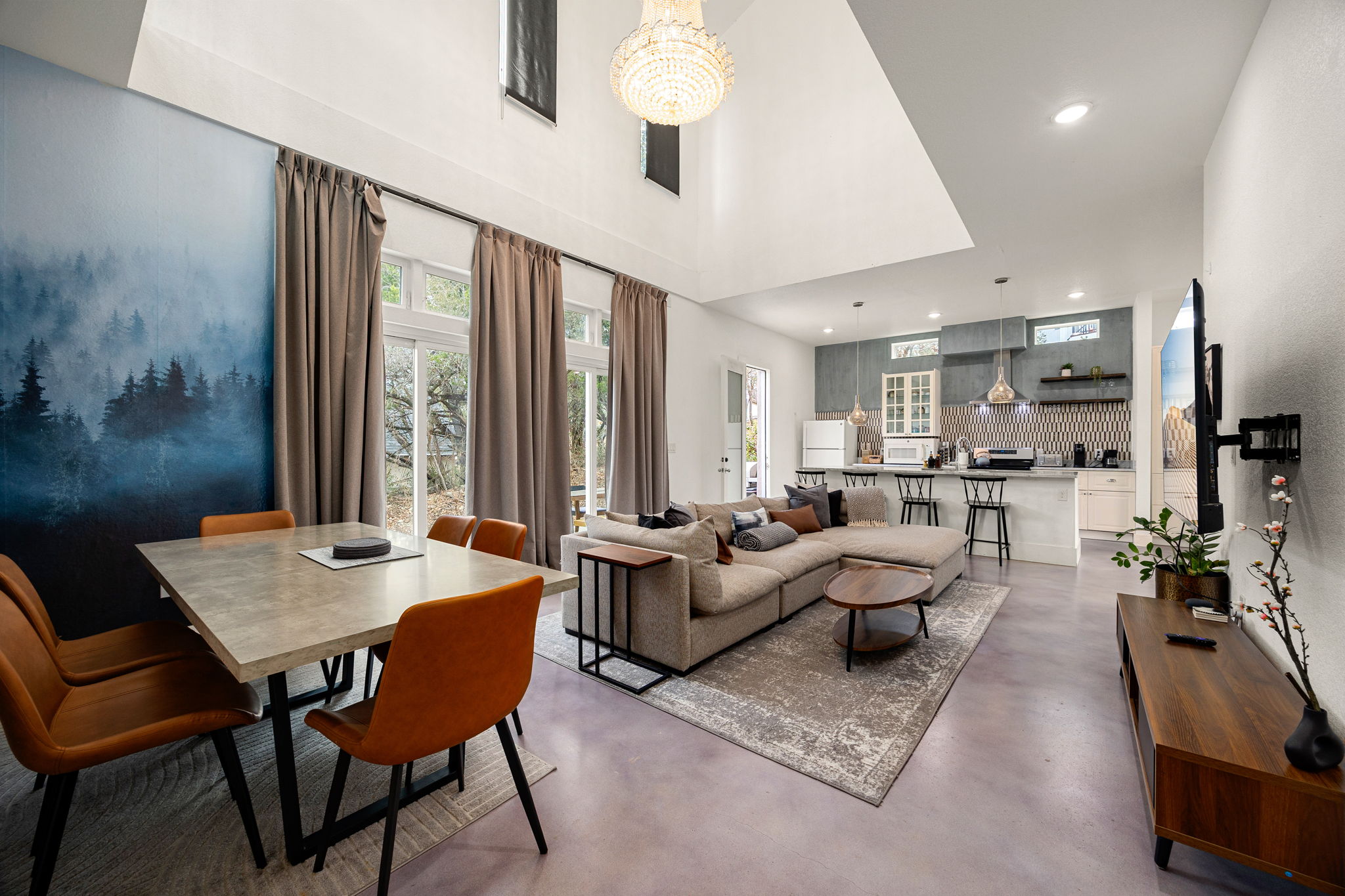 12808 Hughes Street Austin, TX 78732 - Photo 10 of 40 a living room with furniture and a table