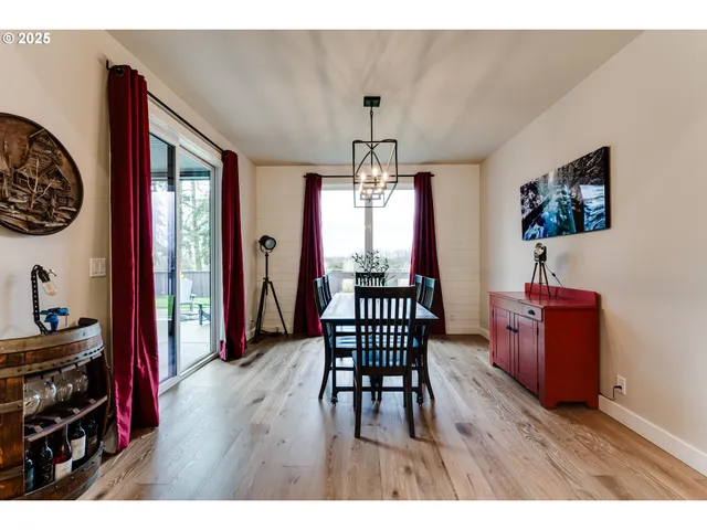 a workspace with furniture window and wooden floor