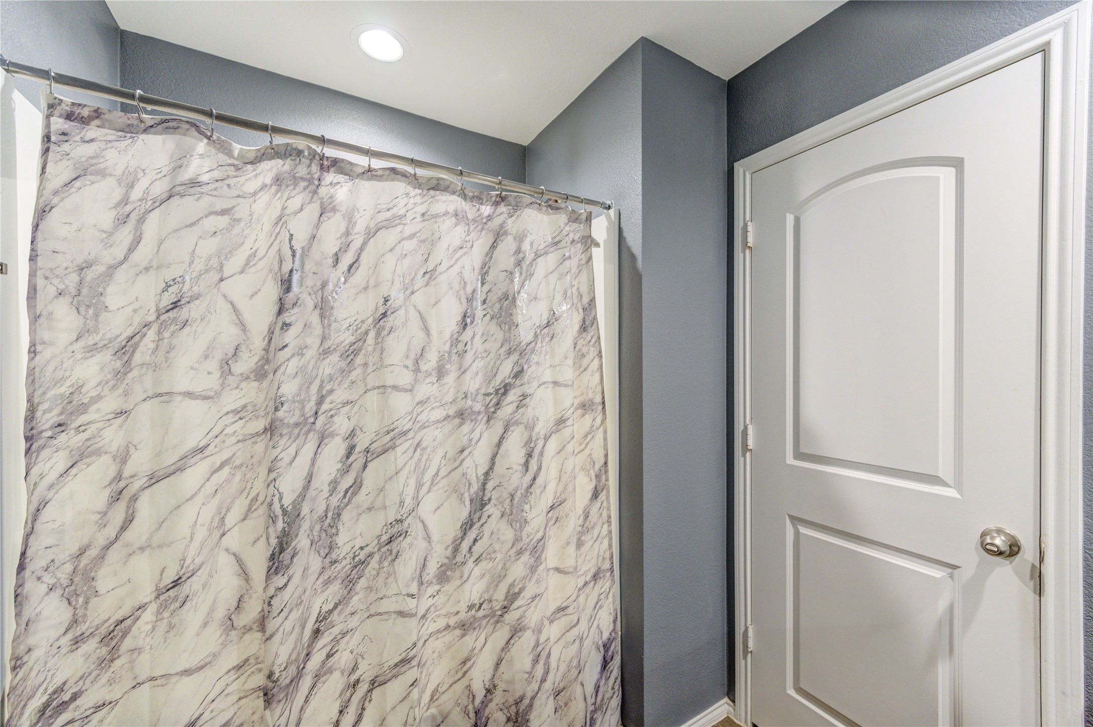 2306 Rainier Mist Road Spring, TX 77373 - Photo 17 of 28 This bathroom features a shower-tub combo