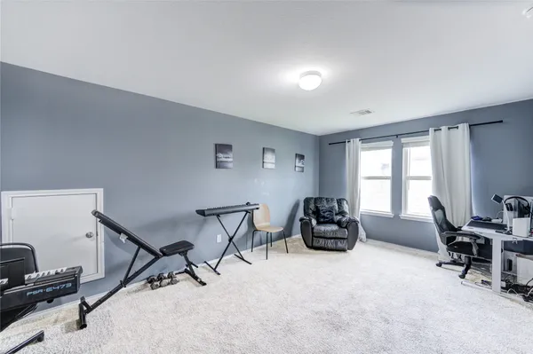 a bathroom with a sink toilet and vanity