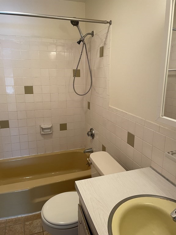 388 Great Road, Unit A11 Acton, MA 01720 - Photo 7 of 11 a bathroom with a sink toilet and shower