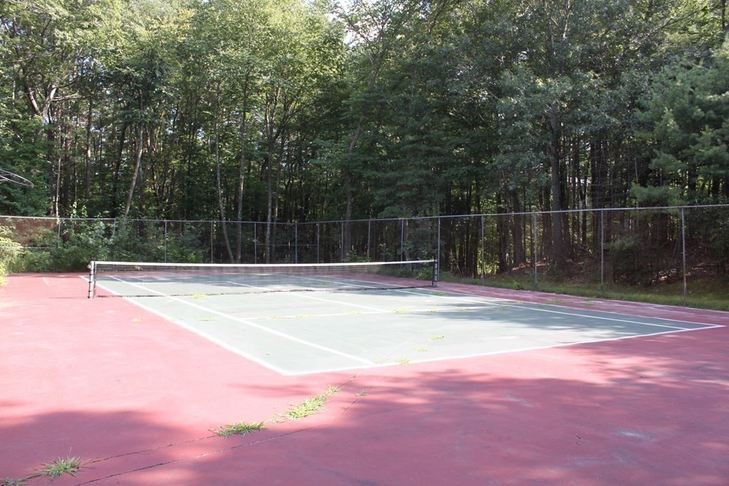 388 Great Road, Unit A11 Acton, MA 01720 - Photo 10 of 11 a view of a backyard