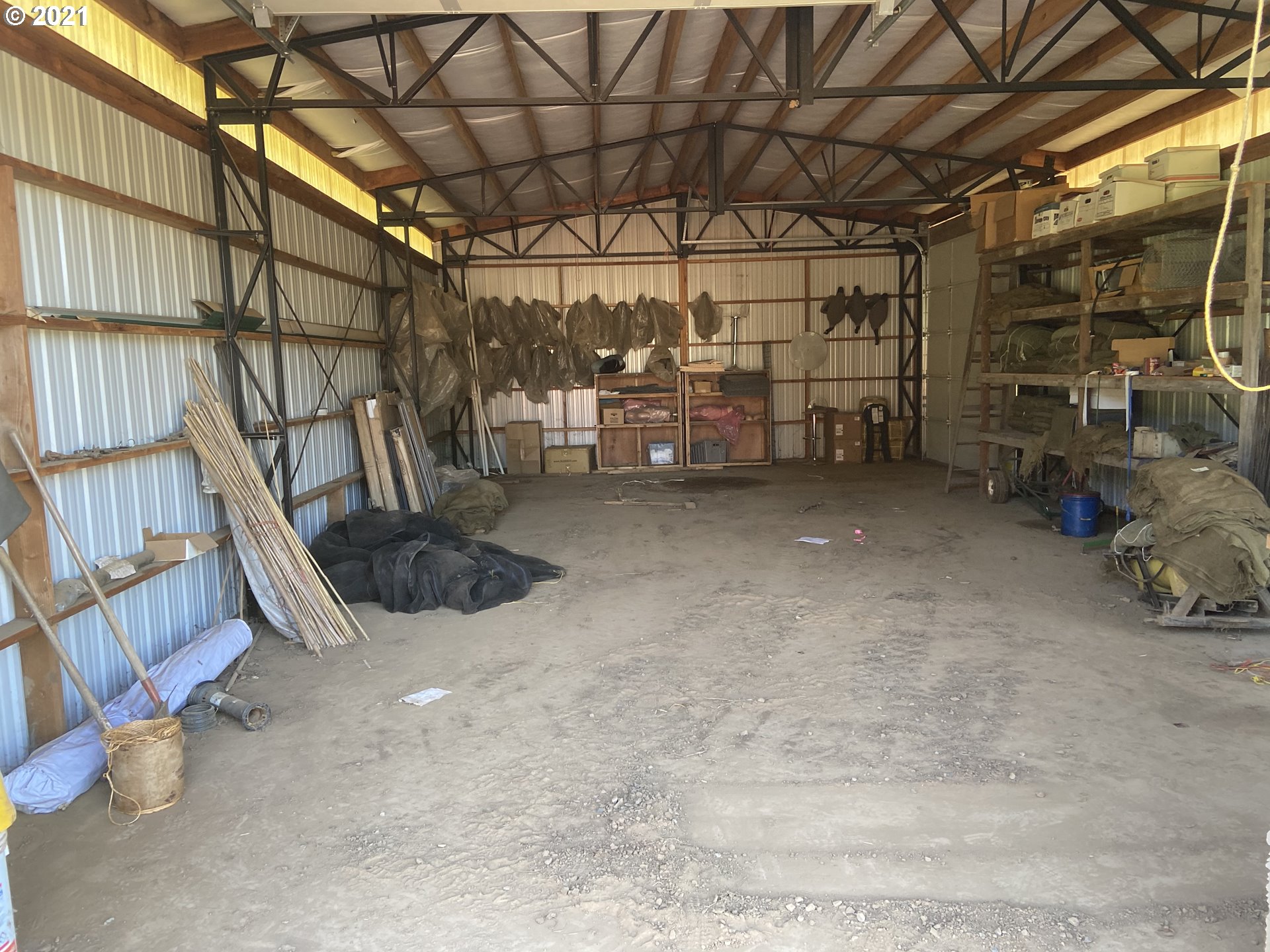 37400 Southeast Hauglum Road Sandy, OR 97055 - Photo 12 of 13 a view of an empty room with a garage