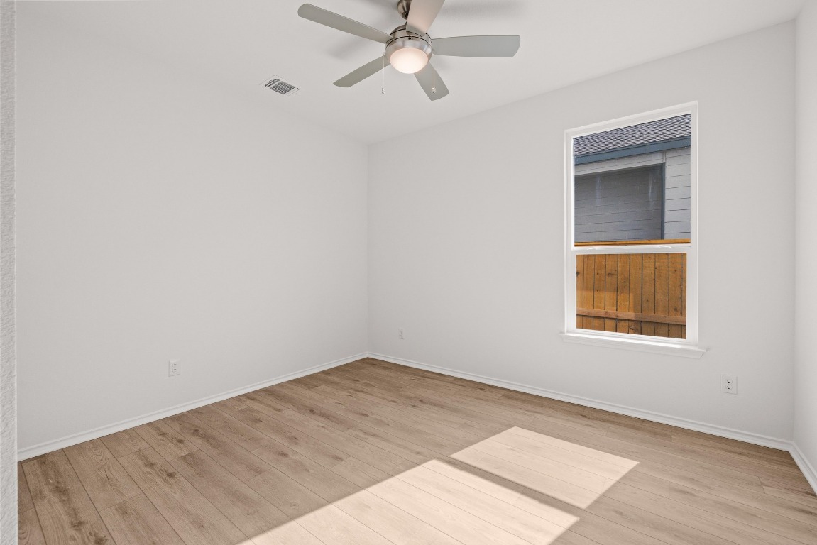 161 Lucky Texan Road Jarrell, TX 76537 - Photo 15 of 32 an empty room with a window and closet