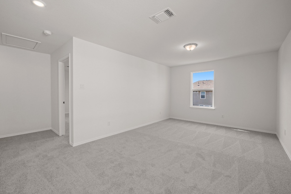 161 Lucky Texan Road Jarrell, TX 76537 - Photo 18 of 32 a view of an empty room with a window