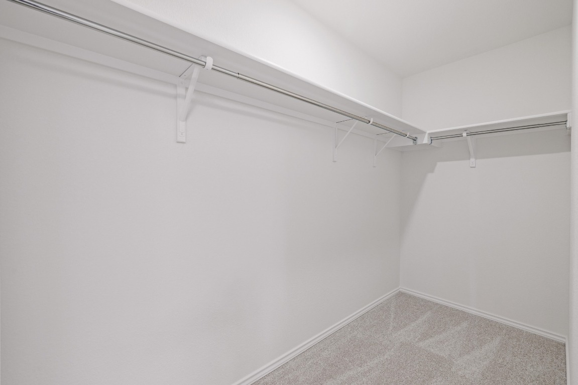 161 Lucky Texan Road Jarrell, TX 76537 - Photo 22 of 32 a view of a room with shelf on the wall