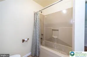 a bathroom with a sink a vanity and a mirror