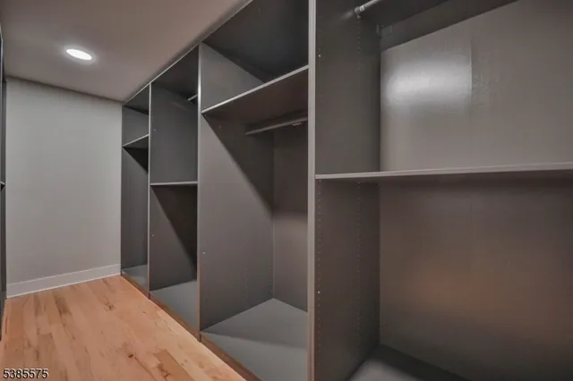 a spacious bathroom with a bathtub and shower