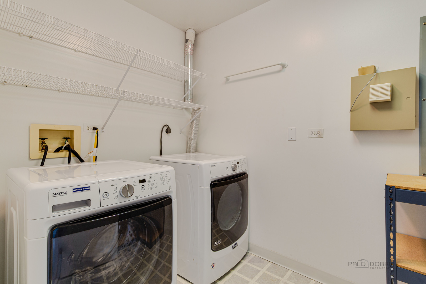211 Rivershire Lane, Unit 602 Lincolnshire, IL 60069 - Photo 24 of 38 a utility room with dryer and washer