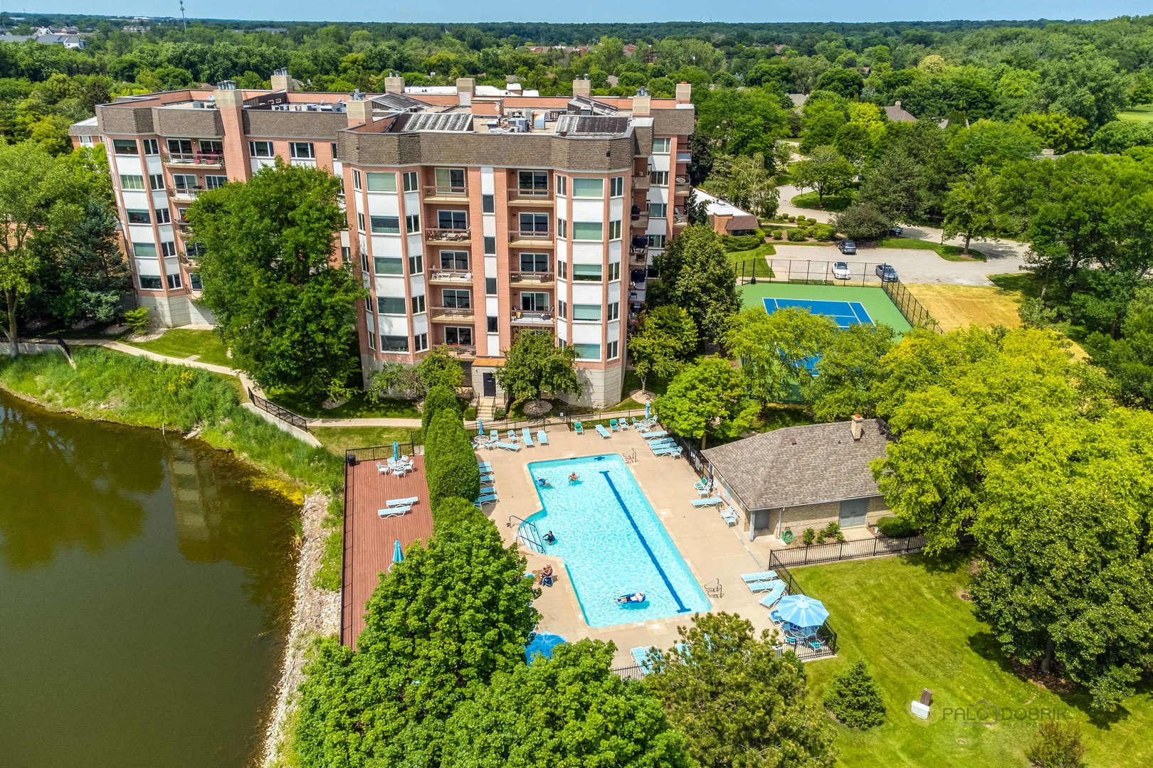 211 Rivershire Lane, Unit 602 Lincolnshire, IL 60069 - Photo 34 of 38 an aerial view of residential houses with outdoor space and street view