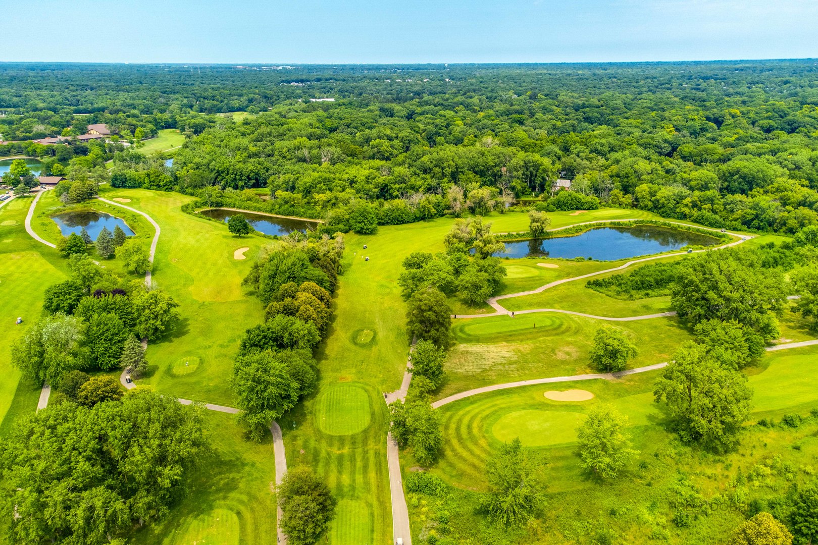 211 Rivershire Lane, Unit 602 Lincolnshire, IL 60069 - Photo 37 of 38 a view of a swimming pool with a yard