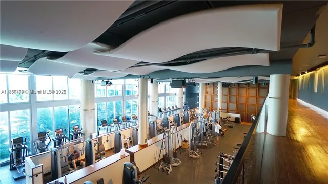 a view of a backyard and swimming pool