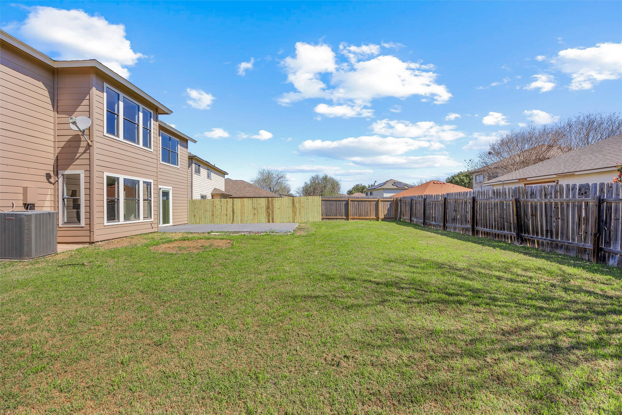7541 Redrick Drive Austin, TX 78747 - Photo 39 of 40 View of yard with cooling unit and a fenced backyard