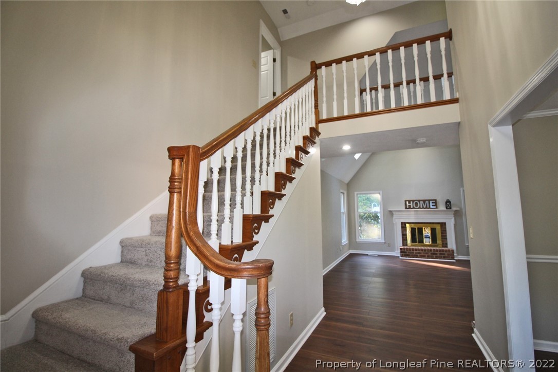 297 Fieldcrest Road Southern Pines, NC 28387 - Photo 3 of 32 a view of an entryway with wooden floor and door