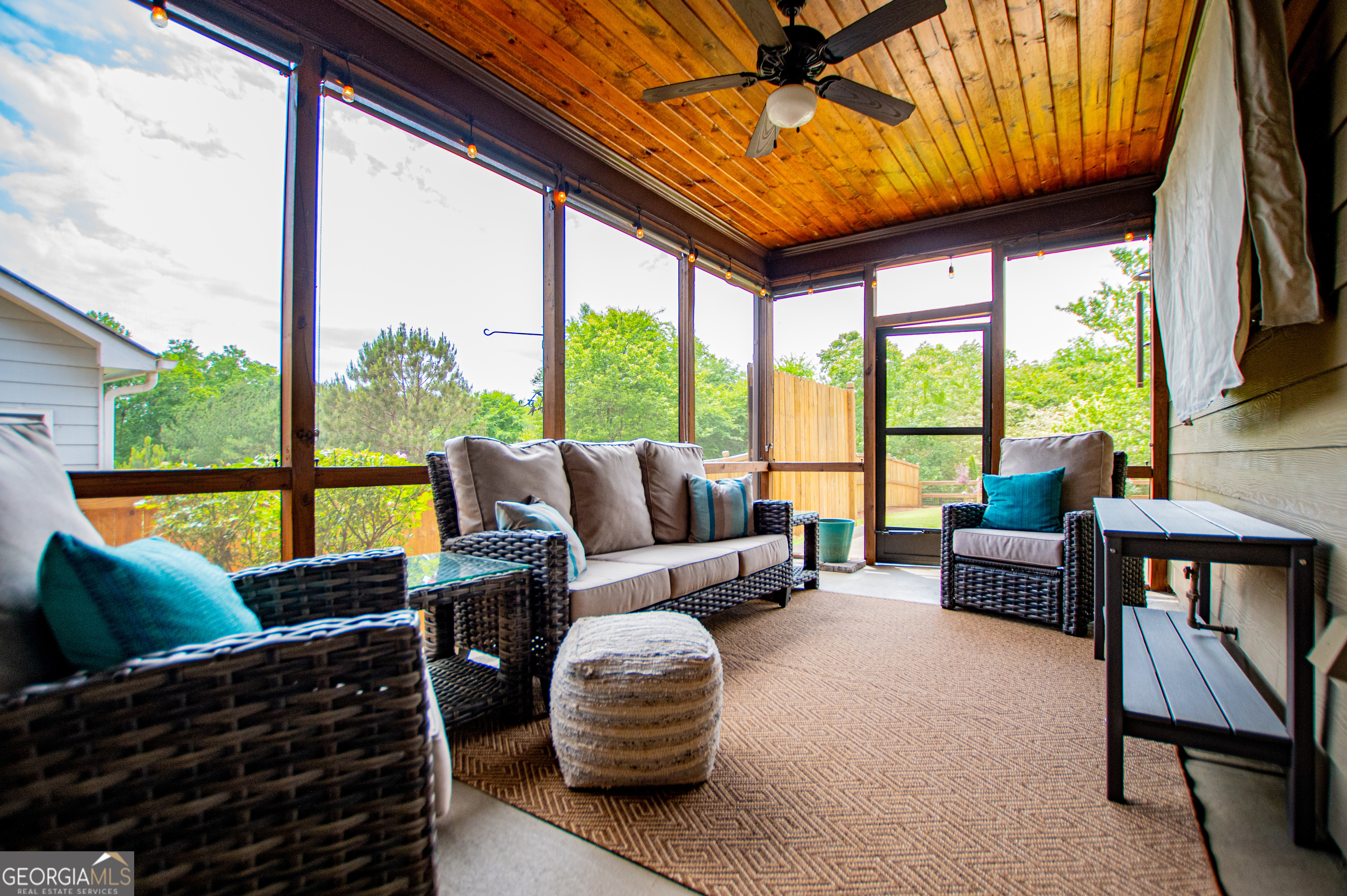216 Yorkshire Lane Villa Rica, GA 30180 - Photo 67 of 94 a living room with furniture a fireplace and a large window