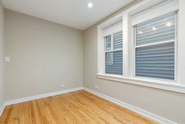 a view of a room that has a window in it