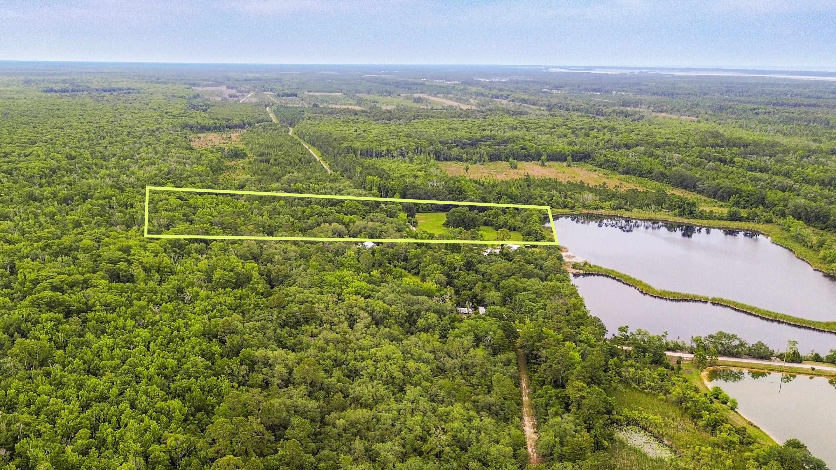 0 Woodlawn Road St. Augustine, FL 32084 - Photo 2 of 4 a view of a city