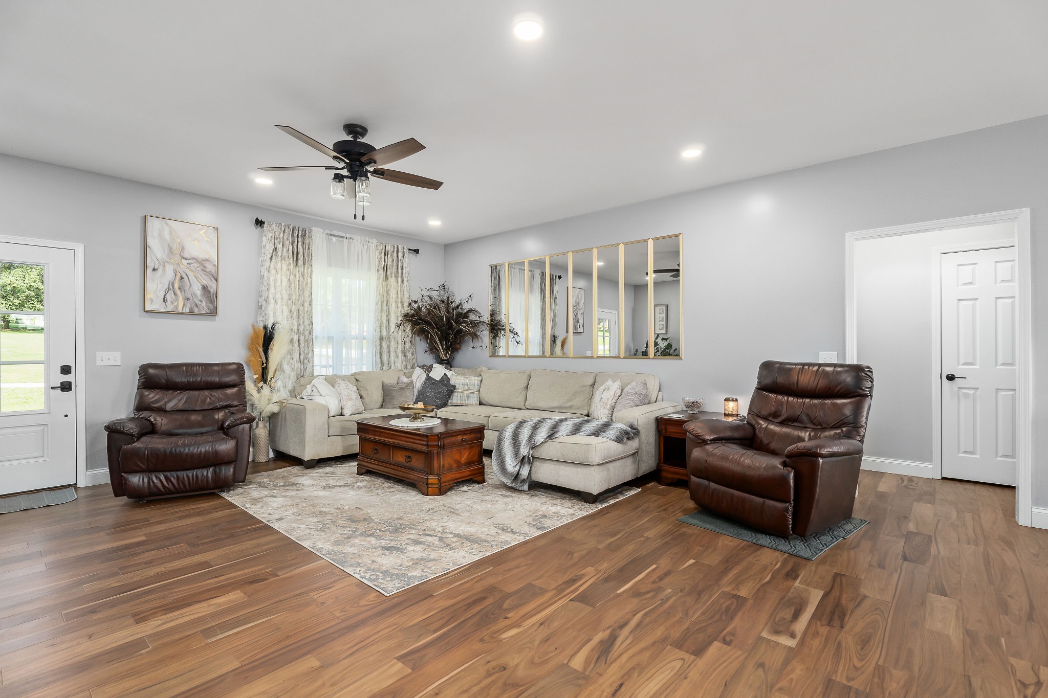 1042 North Spring Street Sparta, TN 38583 - Photo 12 of 36 a living room with furniture and a wooden floor
