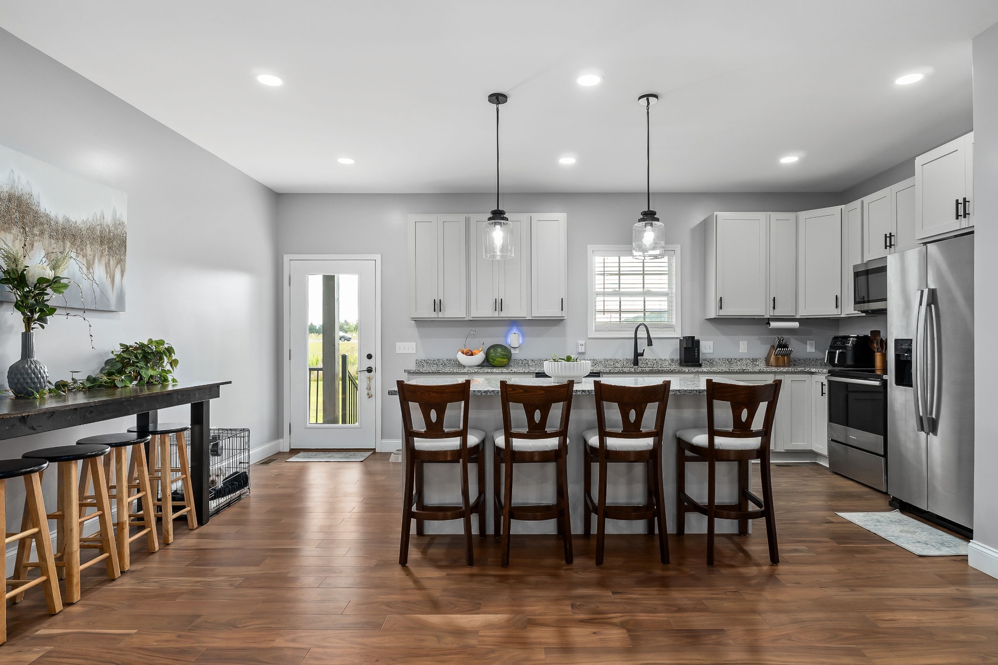 1042 North Spring Street Sparta, TN 38583 - Photo 17 of 36 a large kitchen with a table and chairs
